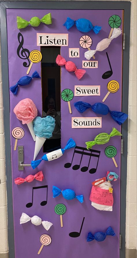 I used tissue paper to make the candies. The music notes were printed on a circuit. Lollipops are construction paper and tongue depressors. Music Makes Life Colorful, Music Teacher Door Decoration, Music Class Door Decor, Music Theme Classroom Ideas, Music Classroom Door Ideas, Back To School Music Bulletin Boards, Music Door Decorations, Music Classroom Door, Elementary Music Classroom Decor