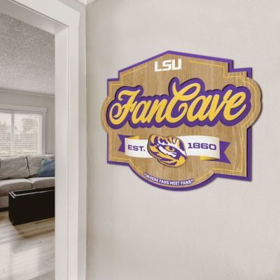 With this attention-grabbing wall display, visitors will make no mistake when they're entering the fan zone. Proudly feature your favorite team in a unique dimensional design that's sure to get compliments. And since it's perfect for home, office, basement, den or gameroom – ANY room can become your official Fan Cave. | YouTheFan NCAA LSU Tigers Fan Cave Sign Home Office Basement, Basement Den, Office Basement, Tiger Wall Decor, Football Door Hangers, Fan Cave, Accent Wall Decor, Floating Wall, Lsu Tigers