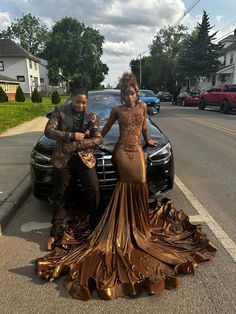 Black And Brown Prom Couple, Gold Dress On Black Women, Long Train Prom Dress, Brown And Gold Prom Dress Couple, Prom Dresses Black Women Plus Size, Hood Prom 2023, Prom Dresses On Black Women, Dark Skin Prom Dress, Prom Dresses Inspo Aesthetic