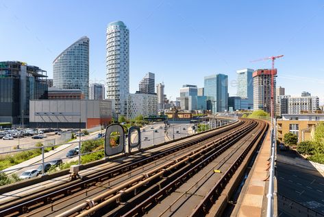 The railway tracks of Docklands Light Railway by mkos83. The railway tracks of Docklands Light Railway with Canary Wharf skyscrapers in the background. #AD #Light, #Railway, #Docklands, #railway Docklands Light Railway, Canary Wharf, Wooden Picture Frames, Building Structure, Wooden Picture, River Thames, Styles Fashion, Aerial View, Railroad Tracks