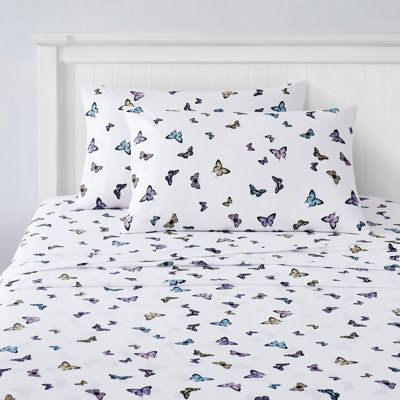 These sheets will bring a bit of the outdoors into your child's bedroom with blue, purple, and yellow butterfly kids printed bed sheet set patterned with super soft double-brushed microfiber. Size: Twin | Sweet Home Collection Butterflies Sheet Set blue / indigo / whiteMicrofiber / Polyester in Blue;pink;sky | Twin | Wayfair Purple And Yellow Butterfly, Yellow Girls Bedroom, Butterfly Sheets, Butterfly Bedroom, Kids Sheet Sets, Vibrant Butterfly, Butterfly Bedding, Kids Sheets, Microfiber Bed Sheets