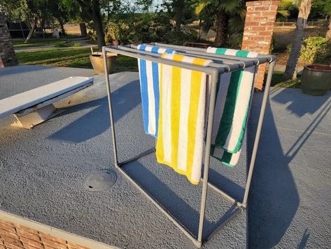 Easy and quick diy towel rack for pool. Learn how to make a standing towel rack for your pool. Pvc Towel Rack, Construction Hacks, Outdoor Towel Rack, Towel Rack Pool, Standing Towel Rack, Folding Hacks, Pvc Pool, Diy Towel Rack, Pool Stuff