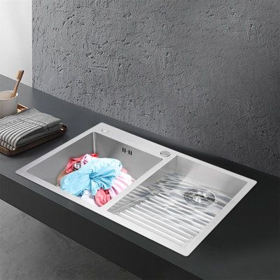 This laundry sink is made of high-quality materials that are sturdy and durable. It features double basins including a large capacity wash basin and washboard basin, which can meet your various needs such as soaking, scrubbing, and so on. It adopts X-shaped water guiding lines, anti-overflow holes, and other thoughtful designs to give it excellent drainage performance, making it a good helper for your cleaning. With it, you can enjoy a more convenient life. | YINXIER 27.5" L x 18.8" W Undermount Utility Sink With Countertop, Laundry Room Sinks Ideas, Laundry Sink With Washboard, Laundry Sink Ideas, Accessible House, Small Laundry Sink, Industrial Kitchen Lighting, Laundry Room Sink, Outdoor Remodel