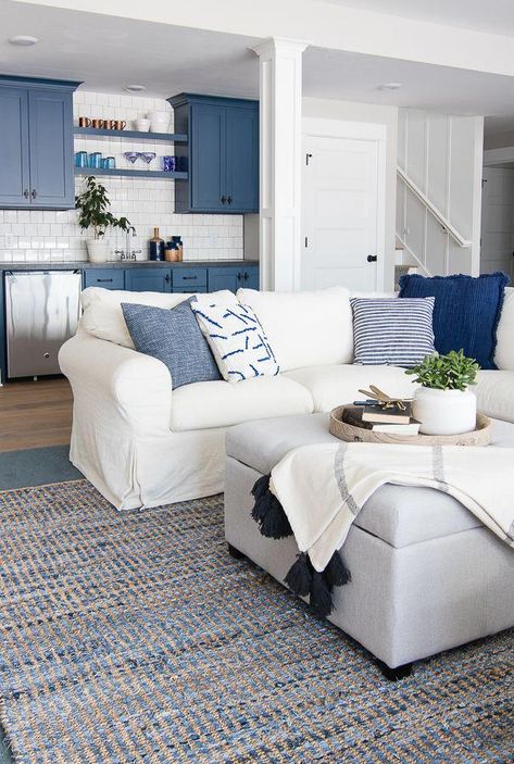 Blue And White Beach House Decor, Small Lake House Bathroom, Navy And White Beach House, Blue And White Basement, Lake Cabin Living Room, Nautical Family Room, Blue And White House Decor, Blue Basement Ideas, Beachy Basement