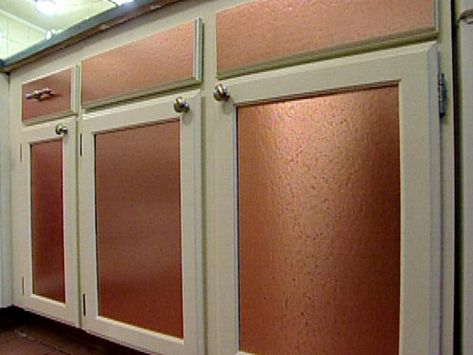 Learn how to update kitchen cabinet doors with beautiful copper panels. Copper Kitchen Accents, Kitchen Cabinet Makeover, Hgtv Kitchens, Update Kitchen Cabinets, Kitchen Layouts, Copper Backsplash, Kitchen Cupboard Doors, Painted Cupboards, Small Kitchen Layouts