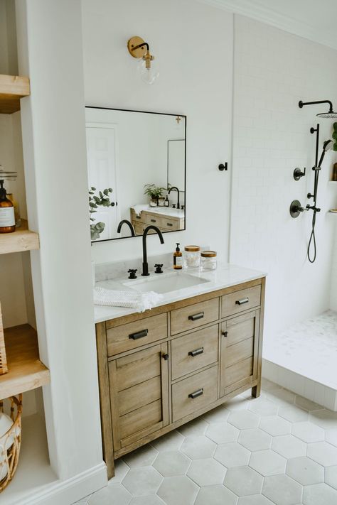 Modern Eclectic Bathroom Remodel - House On Longwood Lane Modern Eclectic Bathroom, White Subway Tile Bathroom, Bathroom Renovation Diy, Makeover Kamar Mandi, Wooden Bathroom Vanity, Black Bathroom Hardware, Vanity Modern, Subway Tiles Bathroom, Eclectic Bathroom