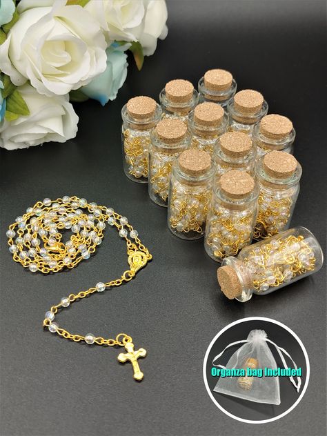 "Each acrylic box contains 12 bottles of rosary in the same color Each rosary has 59 beads and a crucifix cross charm Great gifts as Baptism or Christening favors Light weight yet high quality plated chain Size: total length: 16\"; bead: D-4mm; charm: 0.75\"x0.5\"  Bottle Size :4.3x2.3x2.3cm" Bautizo Ideas Boy Decoration Charro, Baptismal Giveaways, Baby Shower Recuerdos, Charro Theme, Christening Party Favors, Communion Party Favors, Bautizo Ideas, Baptism Party Favors, First Communion Decorations