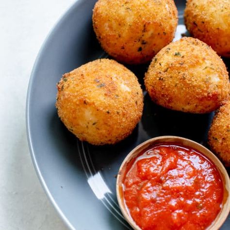 Arancini Rice Balls - Kroll's Korner Arancini Rice Balls, Arancini Recipe, Sriracha Aioli, Italian Breadcrumbs, Flavored Rice, Italian Foods, Food Thermometer, Cheese Rolling, Bechamel Sauce