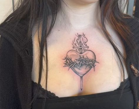 Micah Pisarek • Tattoo Artist on Instagram: "Sacred heart tattoo for eirawyn. It was so fun doing this cool chromelike shading with those dark thorns. We switched up some parts like the flames and the sword to make it similar to the sword from lord of the rings.  - Thank you ALWAYSSS eirawyn for slaying. I was soo sad we couldnt yap it ip as much but your energy is so wonderful and its always a fkn pleasure having you here. Youre the best and i love your ideas and creativity. Thank you always. - - - #sacredhearttattoo #chrometattoo #heartattoo #swordtattoo #thornstattoo #sacramentotattoo #sacramentotattooartist" Proverbs 31 Tattoos, Heart With Thorns Tattoo, Heart With Swords Tattoo, Dark Heart Tattoo, Chest Tattoo Cover Up, Youre The Best, Sacred Heart Tattoo, Heart Tat, Thorn Tattoo