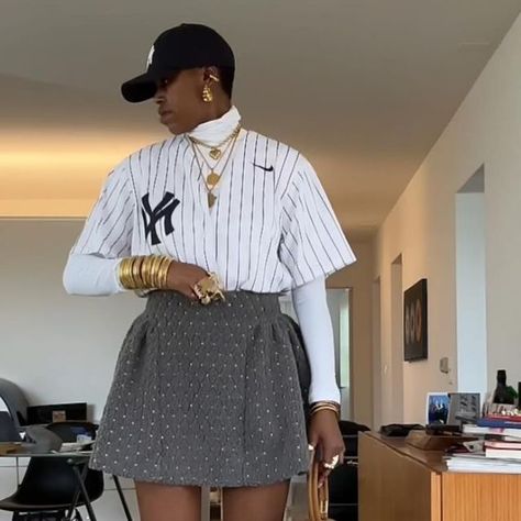 Nthabiseng on Instagram: "You called for stills?! #itsnthabim" Baseball Jersey Outfit Black Women, Jean Skirt And Jersey Outfit, Baseball Jersey With Skirt, Black Women Jersey Outfit, Varsity Jacket And Mini Skirt, Baseball Jersey Outfit Women, Jersey Outfit Women, Fall Streetwear Mini Skirt, Baseball Jersey Outfit