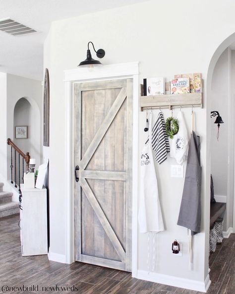 Farmhouse Fanatics on Instagram: “Ever heard of a FAUX barn door? 🚪🤔💭 - 📸 @newbuild_newlyweds 📸 - Well now you’ve seen one! 😍 All they did was add wood to the front of a…” Faux Barn Door, Herringbone Accent Wall, Brick Wall Ideas, Accent Wall In Kitchen, Brick Accent Wall, Interior Brick, Brick Interior Wall, Brick Interior, White Wash Brick