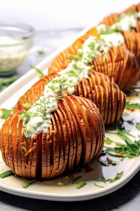 Golden-brown Hasselback Sweet Potatoes on a plate, with crispy edges and a soft interior, seasoned with herbs and a hint of maple syrup. Festive Drinks Christmas, Gluten Free Thanksgiving Side Dishes, Holiday Party Recipes, Sides Thanksgiving, Easy Dinner Sides, Hasselback Sweet Potatoes, Slow Cooker Creamed Corn, Cinnamon Glaze, Creamed Corn Recipes