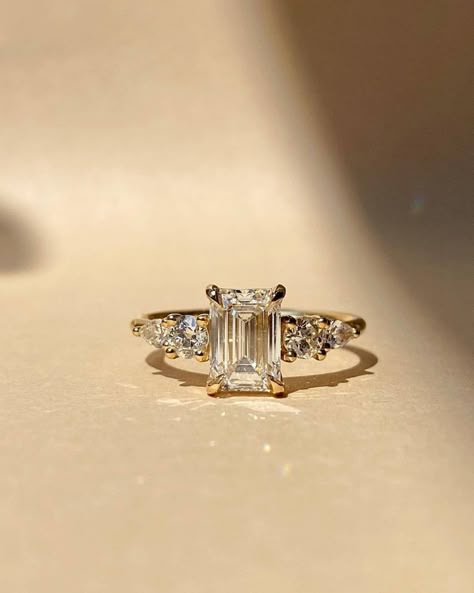 2 CT Emerald Cut Moissanite Solitaire Ring | Hidden Halo Engagement Ring | Dainty Wedding Ring | Unique Proposal Ring | Bridal Gifts/Ring ❤ ITEM DETAILS:- ✦ Brand: The American Gold House (TAGH) ✦ Handmade, high-quality item! ✦ Material: Solid 10K/14K/18K Gold, 950 Platinum and 925 Sterling Silver ✦ Diamond Type: Moissanite Diamond ✦ Diamond Cut: 6x8 MM Emerald ✦ Diamond Weight: 2.0 CT ✦ Main Stone Color: Colorless ✦ Width of Band: 1.8 MM (Bottom) ✦ Diamond Clarity: VVS/VS ❤ ACCENT/HALO DIAMONDS:- ✦ Side Stone Material: Moissanite Diamond ✦ Side Stone Shape: Round Cut ✦ Side Stone Carat Weight: 0.50 CT ✦ Side Stone Color: Colorless ✦ Diamond Clarity: VVS/VS ------------------------------------------------------------------------------ 💎 Moissanite VS Diamond 💎 --------------------------- Colored Moissanite, Solitaire Bands, Ring Inspo, Crunchy Granola, Cute Engagement Rings, Wedding Ring For Her, Future Engagement Rings, Emerald Cut Engagement, Emerald Cut Moissanite