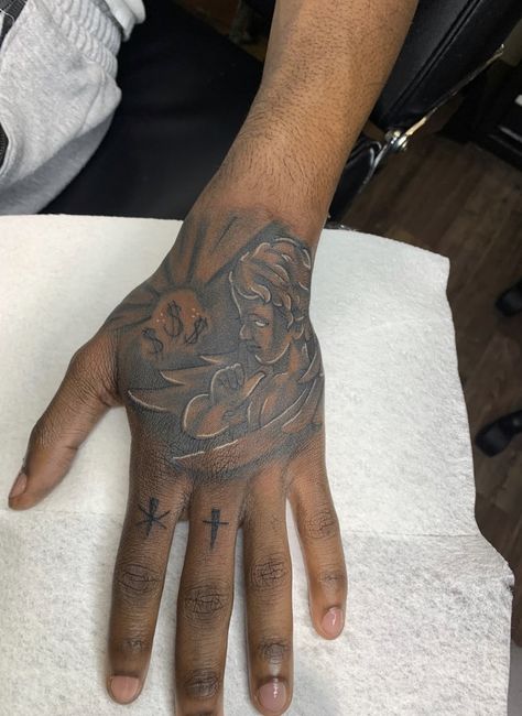 Hand Tattoo Spider Web, Rare Hand Tattoos For Men, Tatoos Hand Man, Black Male Hand Tattoos, Money Bag Hand Tattoo, Hard Hand Tattoos Men, Fist Tattoo Ideas For Men, Half Hand Tattoo Men, Hood Hand Tattoos