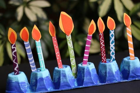 This egg carton menorah with its painted popsicle stick candles is fun and easy for kids to make. It's a great way to teach toddlers and preschoolers about Hanukkah and to allow them to light their own "candles" every night during the holiday. #HappyHooligans #Hanukkah #Craft #Menorah #EggCarton #PopsicleStick #Candles #Toddlers #Preschoolers Hanukkah Activities Preschool, Menorah Craft, Chanukah Crafts, Hanukkah Preschool, Hannukah Crafts, Hanukkah Activites, Hanukkah For Kids, Happy Hooligans, Hanukkah Crafts