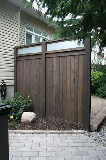 Dark Brown Privacy Fence, Privacy Fence Stain Ideas, Stained Privacy Fence Ideas, Wood Fence Colors Stains, Fence Stain Colors Ideas With Grey House, Dark Fence Ideas, Wood Privacy Fence Stain Colors, Privacy Fence Stain Color, Fence Colors Stained