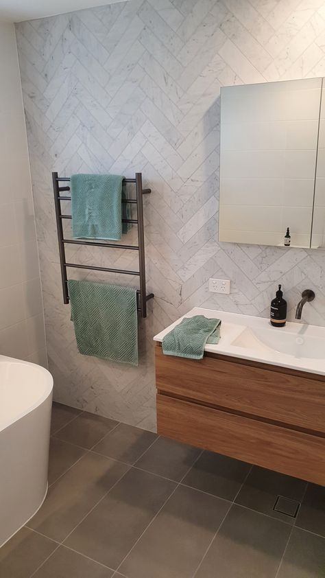 Carrara Herringbone Tile Bathroom, Carrara Tile Bathroom, Herringbone Bathroom Wall, Herringbone Bathroom Tile, Herringbone Bathroom, Herringbone Tile Bathroom, Bathroom Tiles Combination, Carrara Tiles, Small Bathroom Renovations