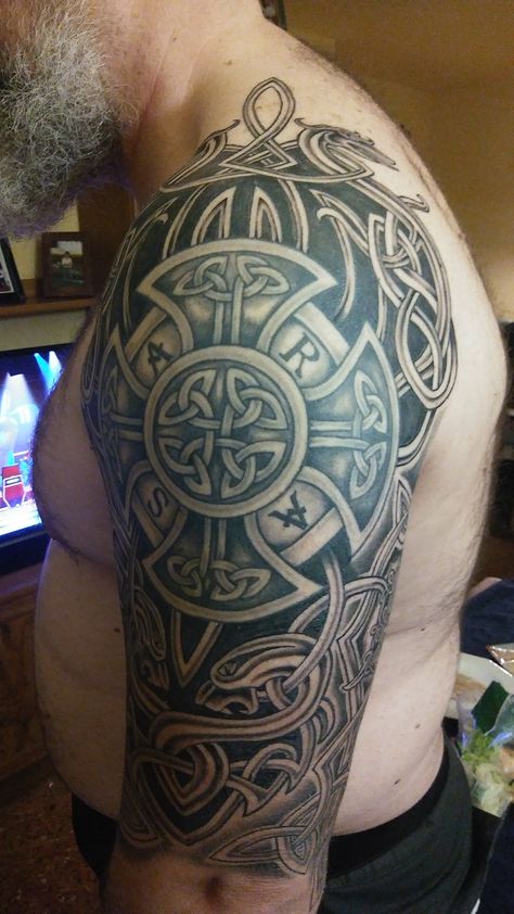 Irish Shoulder Tattoo For Men, Norse Tattoo Ideas For Men, Norse Tattoo Ideas, Irish Sleeve Tattoo, Viking Dragon Tattoo, Cross Shoulder Tattoos, Cross Tattoo Ideas, Celtic Sleeve Tattoos, Celtic Tattoos For Men