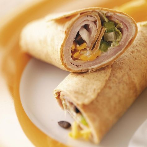 Speedy Lunch Wraps Recipe -This is such a yummy quick lunch. I served one to my sister and a week later she told me that her husband and kids couldn't stop raving about them! —Mary Roberts, New York Mills, Minnesota Cuban Wrap, Wrap Recipes For Lunch, Wraps For Lunch, Ham Wraps, Cuban Pork, Boneless Pork Loin Chops, Pork Wraps, Homemade Ham, Turkey Wraps