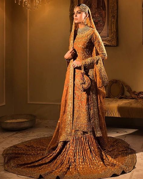 Inbox us to order ✉📬 Or contact 📞 +923074745633 📞☎ (WhatsApp ✔) Orange Gharara, Bridal Gharara, Pakistani Mehndi Dress, Long Kameez, Vintage Color Palette, Lehenga Pakistani, Pakistani Bridal Lehenga, Orange Lehenga, Bridal Mehndi Dresses