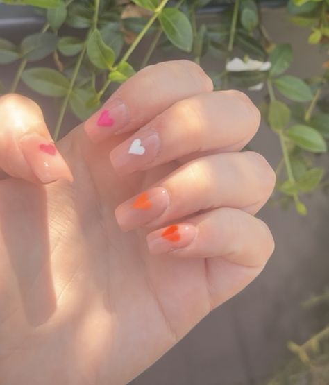 pink/beige nails with hearts in the lesbian pride flag colours Lesbian Pride Nails Designs Simple, Pride Nails Lesbian Flag, Lesbian Pride Nails Designs, Lesbian Flag Nails Design, Lesbian Acrylics, Lesbian Pride Nails Short, Lesbian Nail Designs, Lesbian Color Nails, Lesbian Nail Ideas