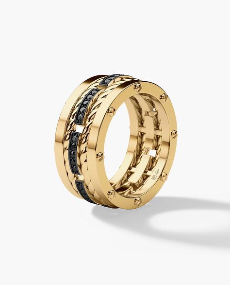 Three bold-looking gold bands pave set with 0.40ct brilliant cut round black diamonds connected by signature exclusive Rockford screws with rope designs flowing in between the bands, our ROPES men’s wedding band has a very modern, striking look with a luxurious spin. This men’s diamond ring will make an exquisite men's wedding band, in addition to being a one-of-a-kind designer ring. Pride Rings, Basic Rings, Rope Wedding Band, Groom Wedding Band, Personalized Wedding Bands, Neutral Jewelry, Non Binary Pride, Wedding Bands For Him, Mens Diamond Wedding Bands