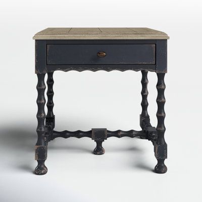 This square end table is carefully crafted from reliable wood with Parisian-inspired details that remind us of our favorite antiques. The cream-colored tabletop with scalloped trim contrasts nicely against the distressed black base. Our favorite design details are the curvy, carved base and a single drawer that helps you tuck away any small essentials you want out of sight. And looks aside, there's plenty of room on its 24"-wide surface for a vase of flowers, framed family photos, or your favori Vintage Kitchen Remodel, A Vase Of Flowers, Square End Table, Decorating 101, Family Photo Frames, Tufted Arm Chair, Vase Of Flowers, Entryway Console Table, Brown Furniture