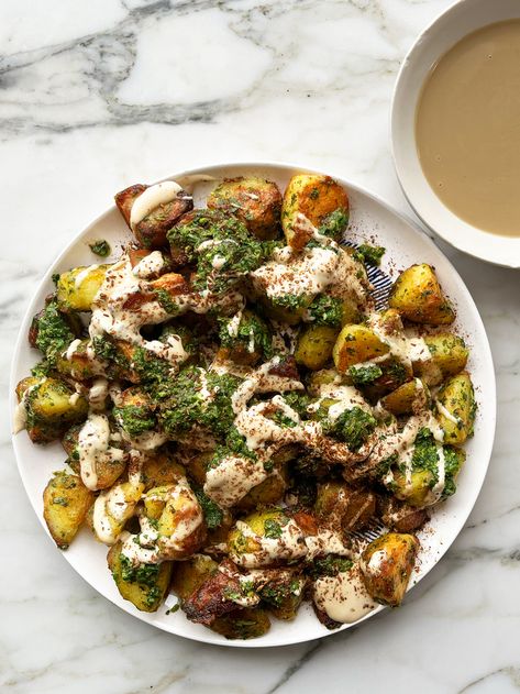 Roast potatoes with green sauce and tahini | Ottolenghi Recipes Mezze Recipes, Brunch Salad, Classic Roast, Ottolenghi Recipes, Tahini Recipe, Yotam Ottolenghi, Roast Potatoes, Green Sauce, Party Food And Drinks