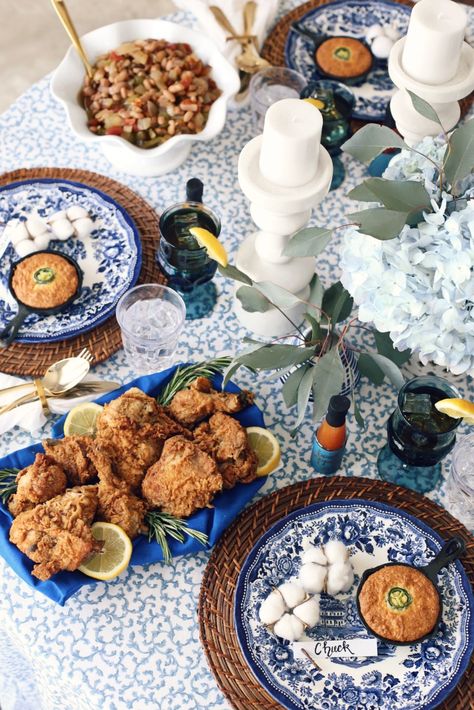 This Southern Style Dinner Party Tablescape & Menu will give you a taste of the South whether you live there or not. Get inspired for stylish entertaining with these themed party tips and ideas. Come on in, Y'all! #tablescape #dinnerparty #entertainingathome #entertaining #bluewhitetablescape Southern Party Aesthetic, Southern Style Party Decorations, Southern Themed Party Food, Southern Themed Party Decorations, Southern Soiree Party, Southern Party Ideas, Clambake Tablescape, Southern Dinner Party Menu Ideas, Southern Tablescapes