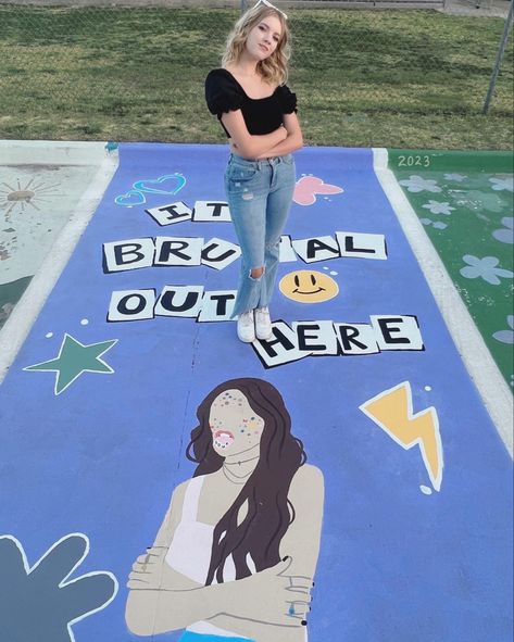 Olivia Rodrigo Parking Spot, Senior Tiles, Parking Spot Senior, Liv Aesthetic, Cute Parking Spot Painting Ideas, Highschool Parking Spot Ideas, Its Brutal Out Here, Painted Parking Spaces Ideas, Olivia Rodrigo Brutal