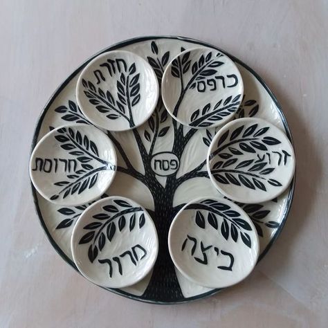 MollyCantor on Instagram: "It's that time of year again, and I have one of these seder plates available to ship or pick up at my gallery. I've been doing a meditation lately that involves imagining a tree, and in all of the leaves are supporters, ancestors, loved ones, teachers and benefactors. It makes me see this tree of life design in a new light.❤ Also coming up is the @asparagusvalleypotterytrail, april 30th and May 1st ( online April 29th). I hope you have it on your calendar! : ) #pass Ceramic Seder Plate, Pesach Crafts, Passover Plate, Ceramic Plates Art, Pesach Seder, Passover Seder Plate, Jewish Symbols, Tree Of Life Design, Pottery Inspo