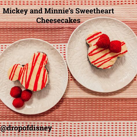 Mickey and Minnie’s Sweetheart Cheesecakes are the perfect Valentine’s dessert! Smooth white chocolate cheesecake rests atop a layer of dark chocolate ganache and an Oreo crust. Top with fresh raspberry sauce for a decadent dessert! #disney #cheesecake #valentine #whitechocolate #mickeymouse #minniemouse Disney Cheesecake, Fresh Raspberry Sauce, Chocolate And Raspberry Tart, Mickey Mouse Cookies, Dark Chocolate Ganache, White Chocolate Cheesecake, Raspberry Tarts, Oreo Crust, Raspberry Sauce