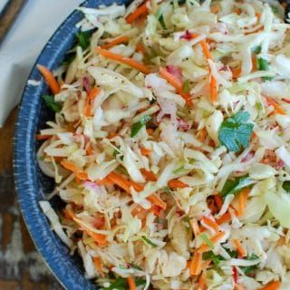 Healthy Coleslaw is a light and healthy coleslaw mixing cabbage, carrots and radishes and tossed in a light dressing and fresh herbs. This is perfect as a side salad or a topping to sandwiches. // acedarspoon.com #healthysalad #salad #coleslaw #cabbage #easylunch #easysalad #quickmeal #glutenfree #vegetarian #vegan Pepper Cabbage, Carrots And Radishes, Healthy Coleslaw Recipes, Bbq Pork Sandwiches, Cabbage Vegetable, Healthy Coleslaw, Vegan Coleslaw, Vegetarian Cabbage, Slaw Recipes