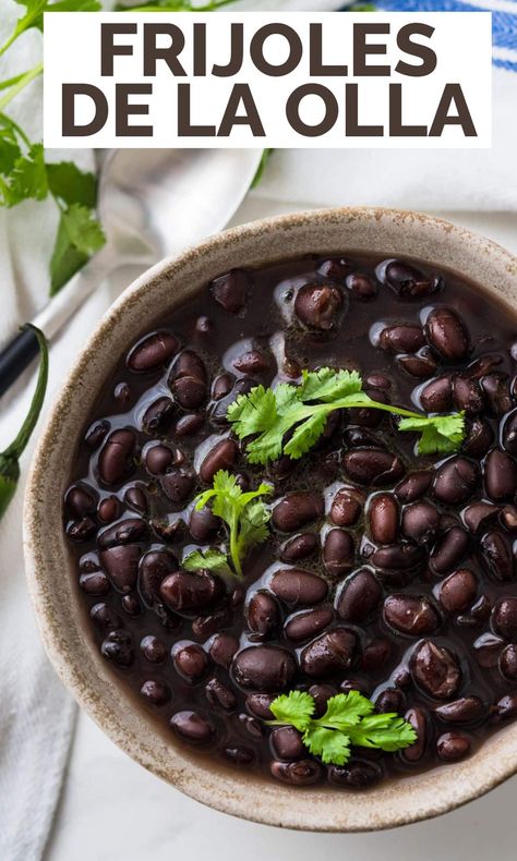 This simple Mexican beans recipe makes a great side dish or vegetarian main course. Frijoles de la olla translates to beans from a pot. It uses dried black beans or pinto beans simmered with water and aromatics for an easy, homestyle dish that's inexpensive and feeds the whole family. Black Beans From Scratch, Pressure Cooker Black Beans, Beans From Scratch, Mexican Black Beans, Cuban Black Beans, Beans And Sausage, Dried Black Beans, Black Beans And Rice, Bean Recipe