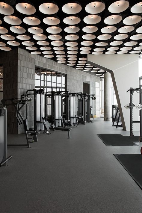 Gym Design Architecture, Dubai Design District, Gym Architecture, Fitness Center Design, Warehouse Gym, Gym Lighting, Gym Design Interior, Dubai Design, Hotel Gym