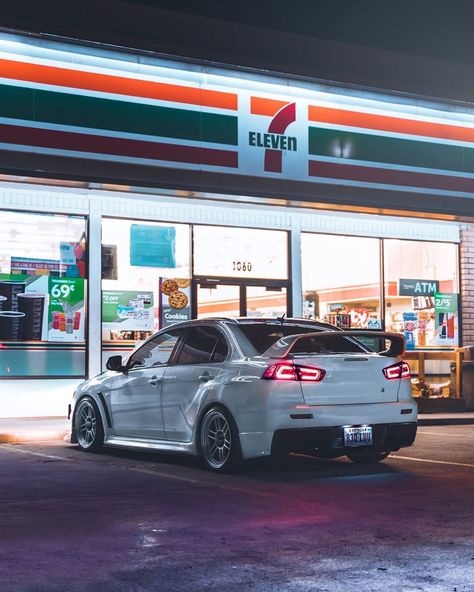 Fransiskus Christian on Instagram: “I’m finally back to night time shooting! And I decided to take it on @7eleven, because it seems like everyone has their photos taken here…” New Car Aesthetic, Infiniti Sedan, Car Aesthetic Wallpaper, Car Aesthetic Interior, Car Accessories Aesthetic, Jdm Wallpaper, Lancer Evo, Evo X, Mitsubishi Evo