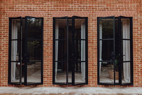 Black Steel Doors, French Country Patio, External French Doors, Black Stainless Steel Kitchen, Steel French Doors, Bluestone Patio, Exterior Inspiration, Kitchen Doors, Patio Stones