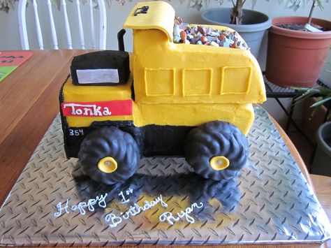 Tonka truck cake.  Covered in buttercream, they asked for little to no fondant which I would have preferred to cover this with.  Thanks for ... Backhoe Cake, Tonka Truck Cake, Dump Truck Cake, Cake Truck, Dump Truck Cakes, Digger Cake, Dump Truck Birthday Party, Truck Birthday Cakes, Monster Truck Cake