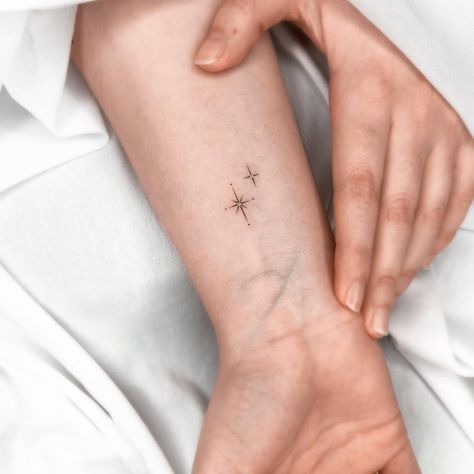 Second Star Tattoo, Cross Star Tattoo, Rewrite The Stars Tattoo, Stars On Wrist Tattoo, Star Tattoo Ankle, North Star Tattoo Wrist, Stars In A Line Tattoo, Wrist Star Tattoo, Minimal Stars Tattoo