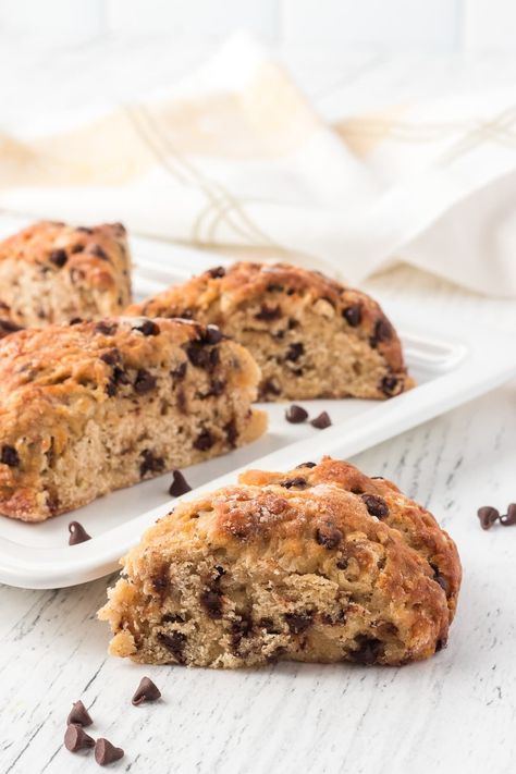 Banana Chocolate Scones are soft, moist, and full of chocolate chips! Sweetened with honey and lightly spiced, these banana scones pair perfectly with your morning coffee. They're perfect for brunch! Banana Scones Healthy, Banana Scones Recipe, Chocolate Chip Scones Recipe Easy, Easy Chocolate Chip Scones, Peanut Butter Chocolate Chip Scones, Banana Chocolate Chip Scones, Chocolate Chunk Scones, Afternoon Tea Scones, Oatmeal Scones