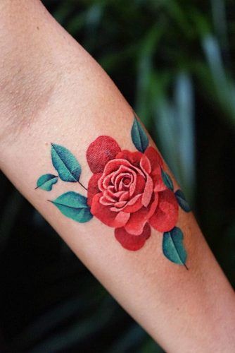 Rose Tattoos And Their Origin, Symbolism, And Meanings ★ See more: https://glaminati.com/rose-tattoos-designs/ Modern Rose Tattoo, Rose Tattoo Arm, Rose Tattoo With Name, Wild Rose Tattoo, Rose Tattoo On Arm, Red Rose Tattoo, Skeleton Hand Tattoo, Tattoo Arm, Rose Tattoo Design