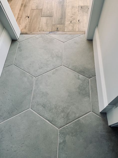 Hall To Bathroom Floor Transition, Hexagon Tile Living Room, Tile Styles Floor, Tile Colors Floor, Beachy Bathroom Tile, Slate Tile Bathroom Shower Walk In, Large Hexagon Bathroom Floor, Powder Room Ideas Tile, Transitional Tile Flooring Ideas