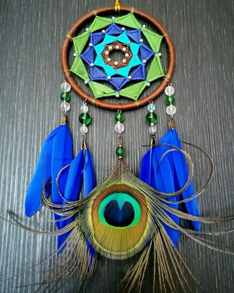 #gardenofeva #dreamcatcher #dreamcatchers #dreamcatchermalaysia #rangoliweave #madebyyourstruly #madewithlove #handcrafted #carrearviewdreamcatcher Dream Catcher Craft, Blue Feathers, Green Thread, Blue Feather, Dreamcatchers, Peacock Feather, Dream Catchers, Evil Eye, New Design