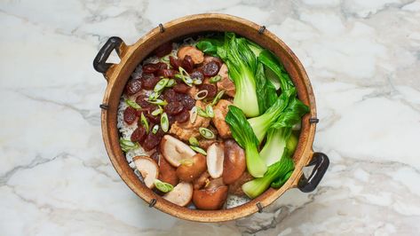 This Hong Kong staple is the ultimate one-pot comfort food. Once you learn the technique, you can swap out the sweet-savory Chinese sausage and chicken, earthy shiitake mushrooms, and tender bok choy called for here for any number of other ingredients. Clay Pot Rice Recipe, Chinese Clay Pot, Claypot Rice Recipe, Pot Rice Recipe, Clay Pot Rice, Follicular Phase, Asian Store, Vietnamese Soup, Chinese Chicken Recipes