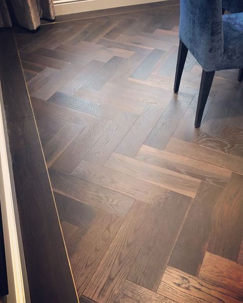 Beautiful dark, rich in tone, engineered herringbone floors with feature brass inlay to the border.  #engineeredflooring #interiordesign #parquet floor #woodfloorideas #solidwoodfloor #herringboneflooringideas Parquet Flooring Border, Floor Borders Ideas, Wood Chevron Floor, Parquet Flooring With Border, Herringbone Floor With Border, Brass Inlay Floor, Dark Parquet Flooring, Wood Floor Border, Dark Herringbone Floor