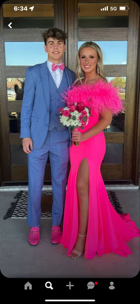 Bright Prom Dresses 2023, Hot Pink Pageant Dress, Hot Pink Prom Dress With Feathers, Prom Date Color Ideas, Fuschia Prom Couple, Hot Pink Prom Outfits For Couples, Hot Pink Prom Dress With Gray Suit, Hot Pink Dresses Prom, Flowers To Go With Hot Pink Prom Dress