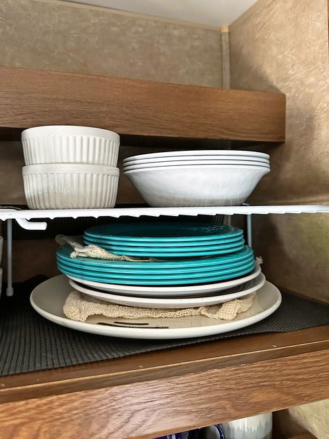 21 Genius Camper Tips and Tricks to Save Space and Stay Organized - Inspired Routes Rv Camping Tips, Camping Checklist, Rv Camping, Camping Hacks, Staying Organized, Space Saving