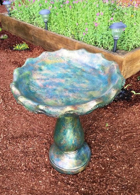 I bought a cement birdbath about a month ago from Walmart. I've always liked birdbaths, but have not owned one due to the cost. The ones I've seen in the past have always been over $100 and I just didn't feel like spending that kind of $$ on one. Then, when I was at Walmart one day, I thought I'd stroll through the garden statues they had in the parking lot. I asked one of the employees how much the birdbaths were and he said $24.99. $24.99????!!!! I must have one! So, I bought one and… Paint Bird Bath, Painted Bird Bath, Cement Bird Bath, Bird Bath Painting Ideas Concrete, Bird Bath Makeover Concrete, How To Paint A Concrete Bird Bath, Diy Concrete Bird Bath Bowl, Aging Terra Cotta Pots, Faux Painting Techniques