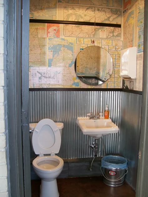 I remodeled the bathrooms at our family business.  Since it is a gas station, I collected vintage gas station road maps & "papered" the walls with them.  Mirror was hung from black painted picture rail molding. Garage Bathroom Ideas, Pinterest Bathroom, Garage To Living Space, Add A Bathroom, Garage Floor Paint, Garage Bathroom, Man Cave Bathroom, Garage Room, Rv Bathroom