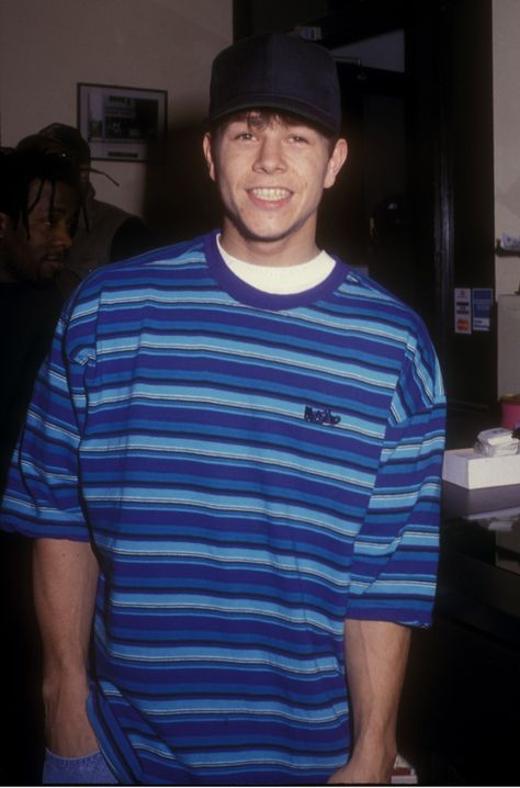 Ah, the Nineties. A decade where Tevas and feathered bangs ran supreme. Your biggest worry was feeding your Tamagotchi and rearranging your butterfly clips. But don't get us wrong, it was still a ful... 90s Actors, 90s Men, Mark Wahlberg, Celebrity Tattoos, Film Serie, Jennifer Aniston, Eminem, 90s Fashion, Celebrity Crush